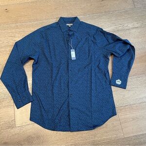 Peter Millar summer comfort, size M. Lakewood country club insignia on cuff.